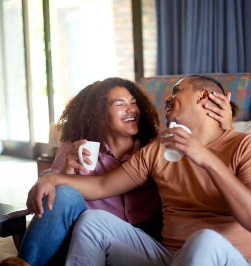 Gottman Relationship Adviser conflict hero image - couple laughing together